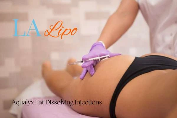 Woman having fat dissolving injections Barry on thighs